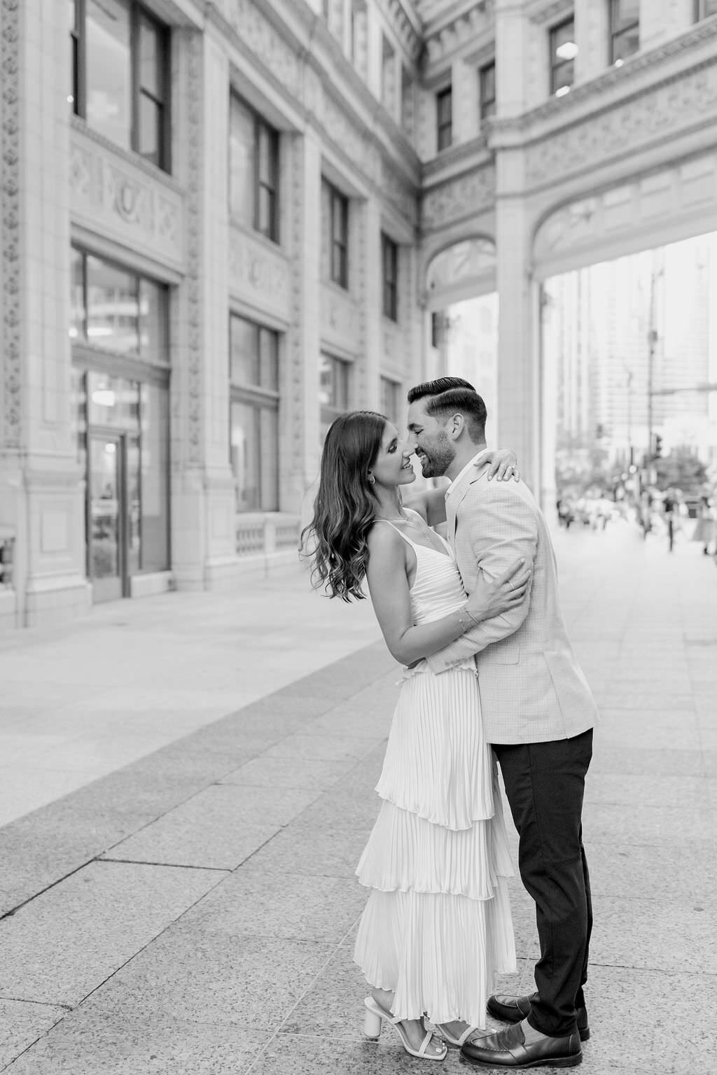 An engagement photography session at The Wrigley Building and North Ave Beach in Chicago, Illinois - 23