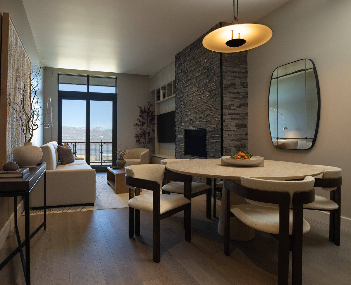 Close-up of a plush sofa and styled coffee table in a luxury Airbnb living room at Grand Hyatt Deer Valley, designed by Sister Studio.