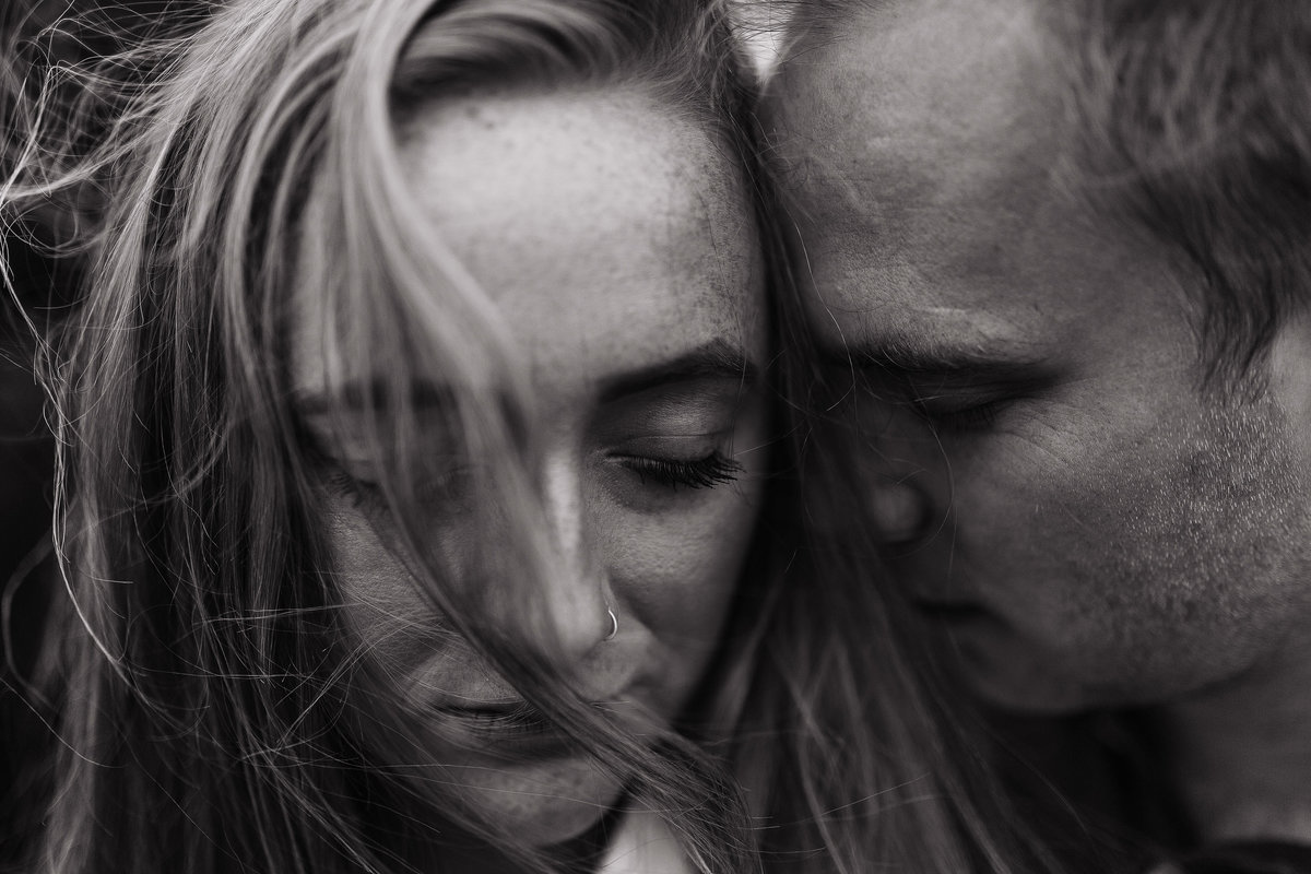 a close up photograph of a couple on their engagement shoot