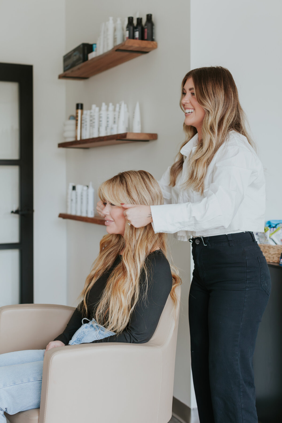 female-hairstylist-with-client-in-salon-for-brand-session-south-charlotte