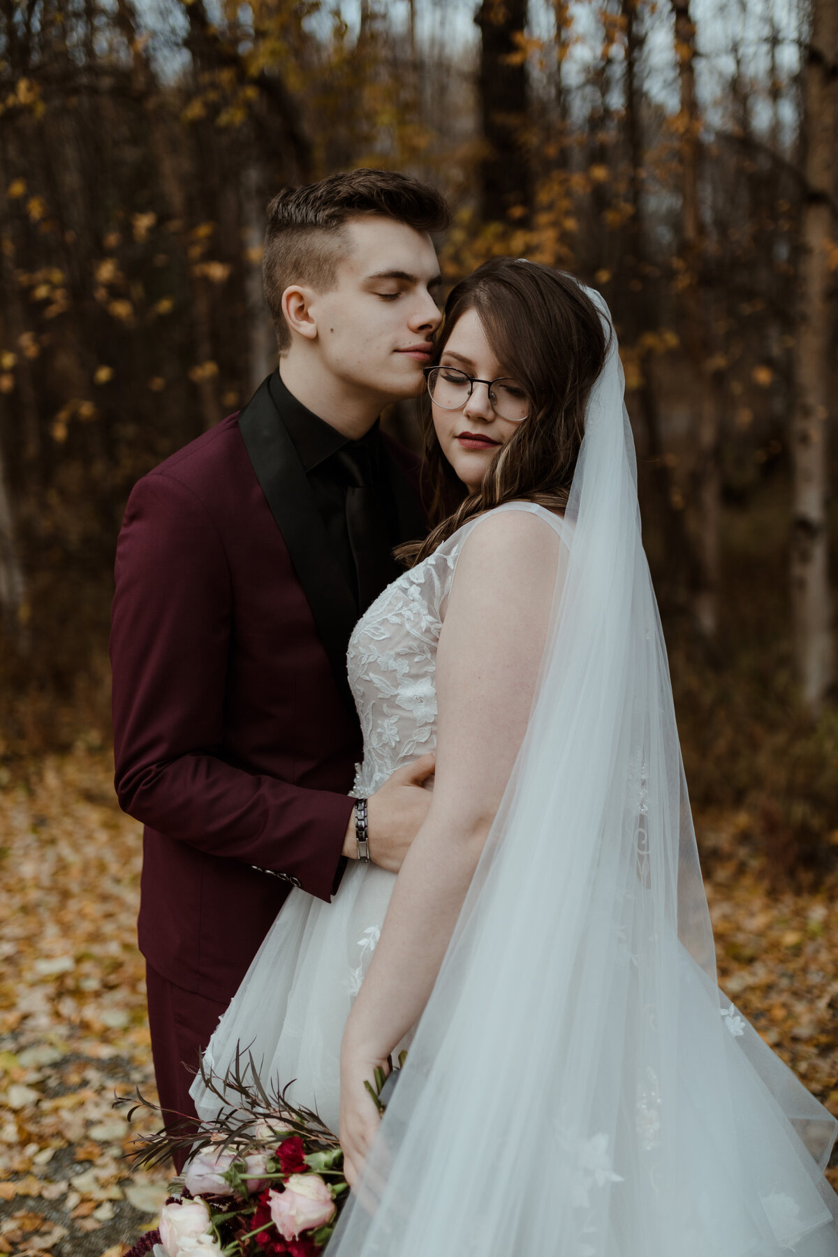 bride and groom posing