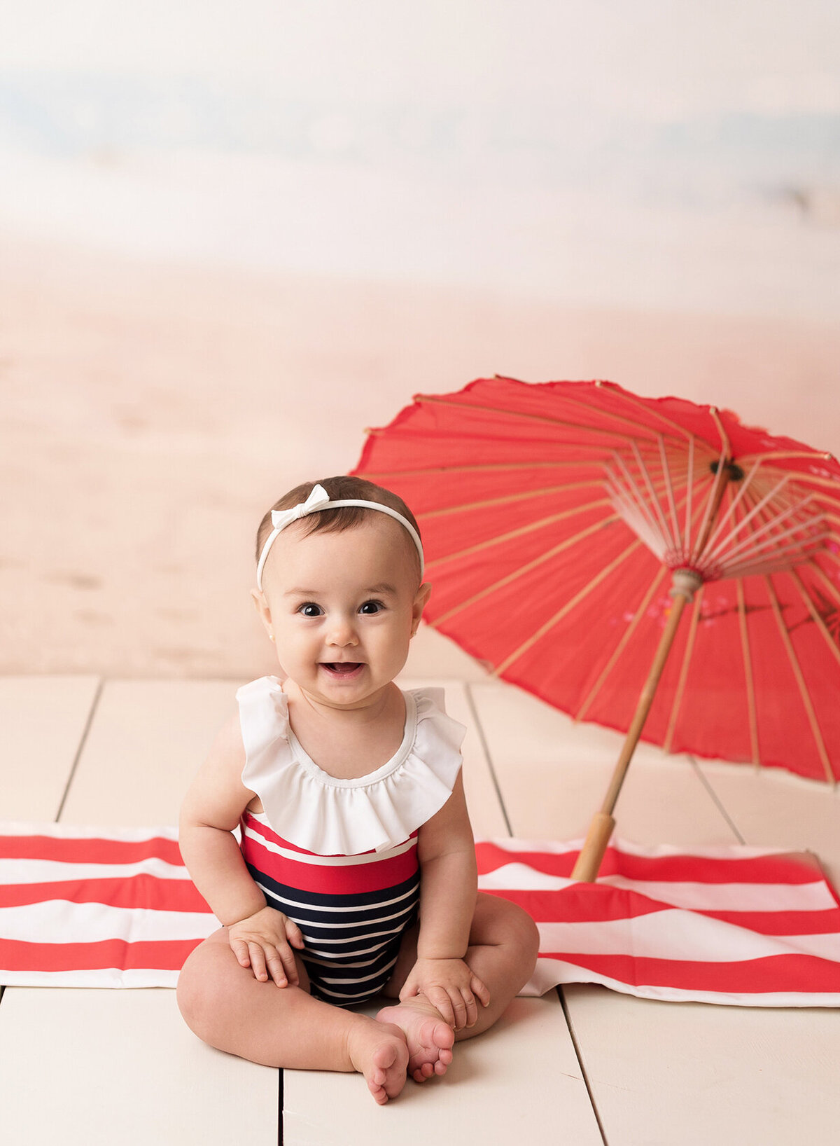 Cute little baby in a summer, beach themed photoshoot in Houston