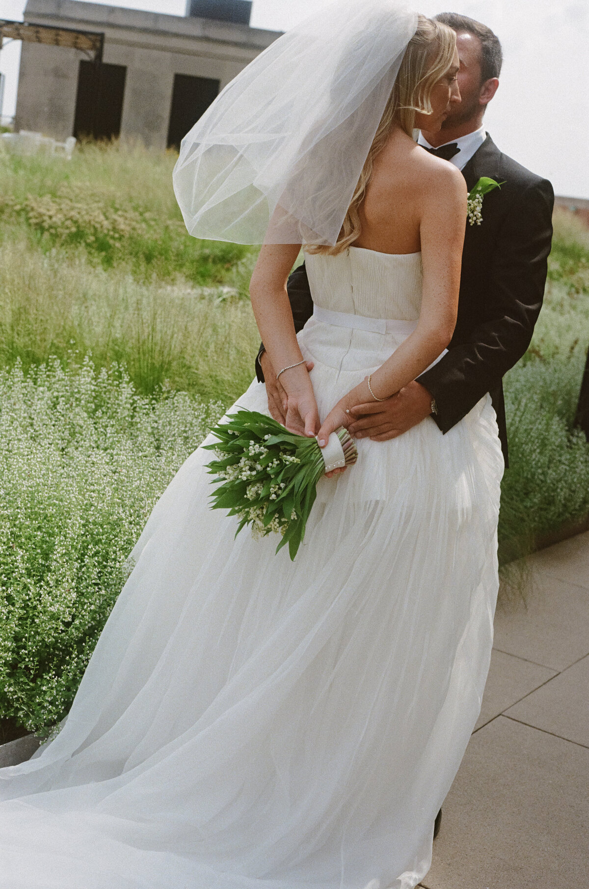 Sophisticated editorial wedding photography showcases ceremony moments at Old Post Office Chicago, featuring Lauren Alatriste's fashion forward approach combining magazine-worthy imagery with architectural beauty and authentic emotional storytelling.