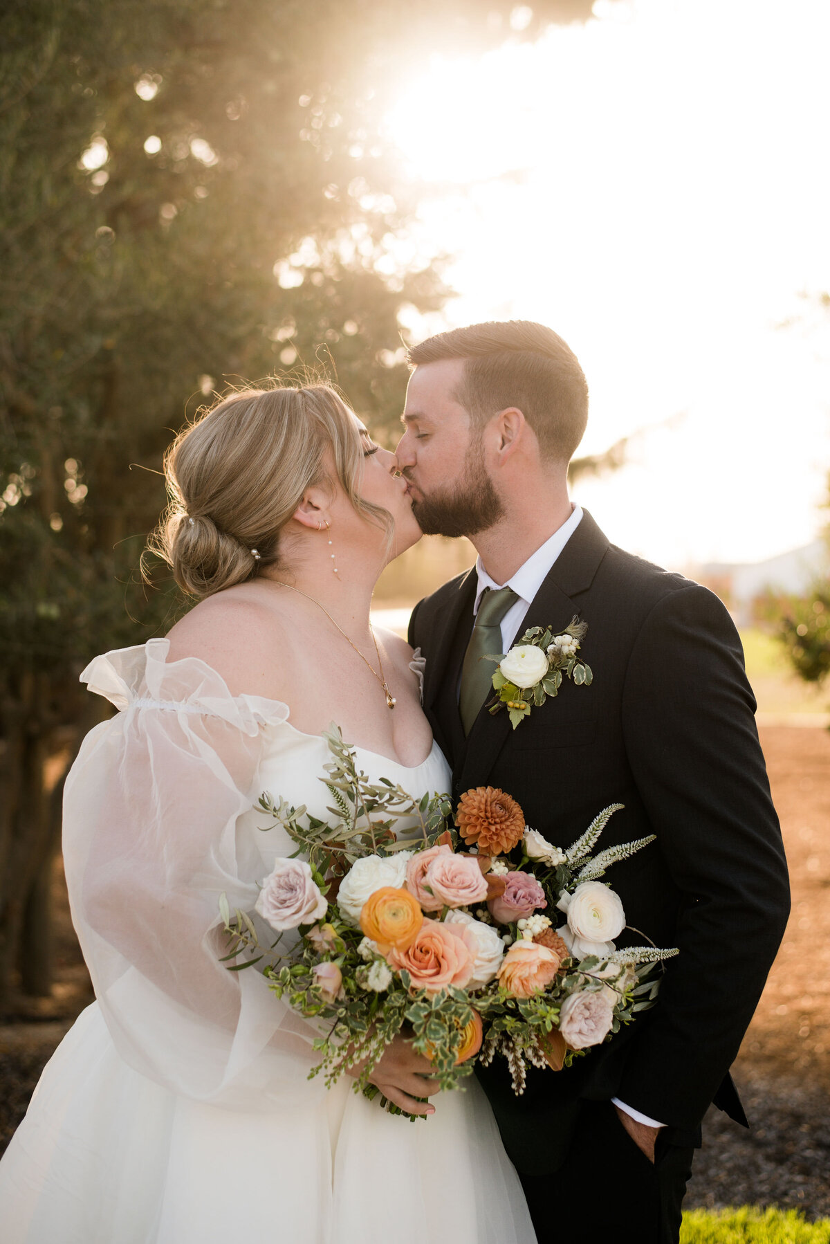 Bride, groom, and bouquet | Bella Fleur