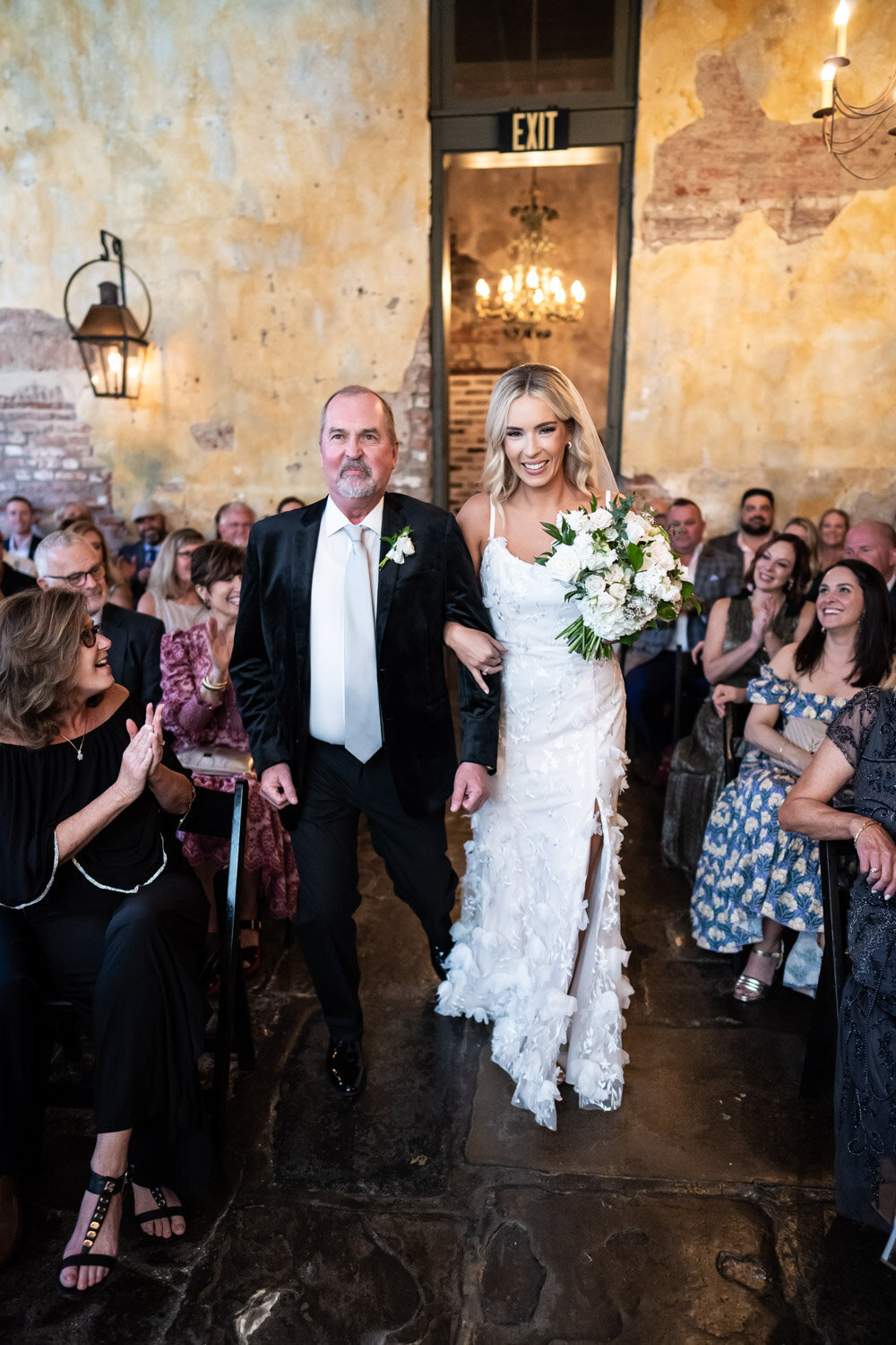 Bride and father walk down the aisle