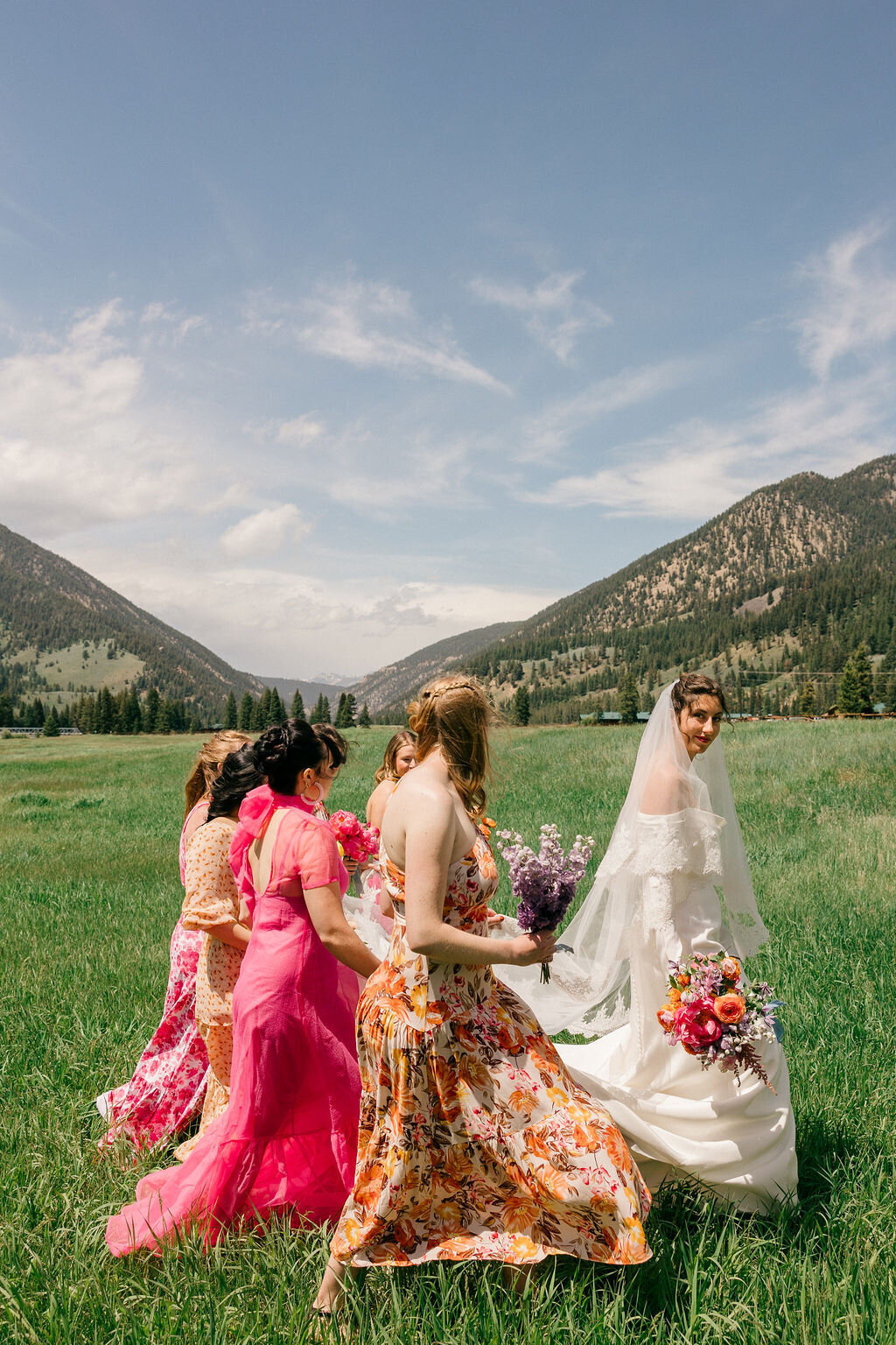 colorful mismatched bridesmaids dresses in Big Sky Montana
