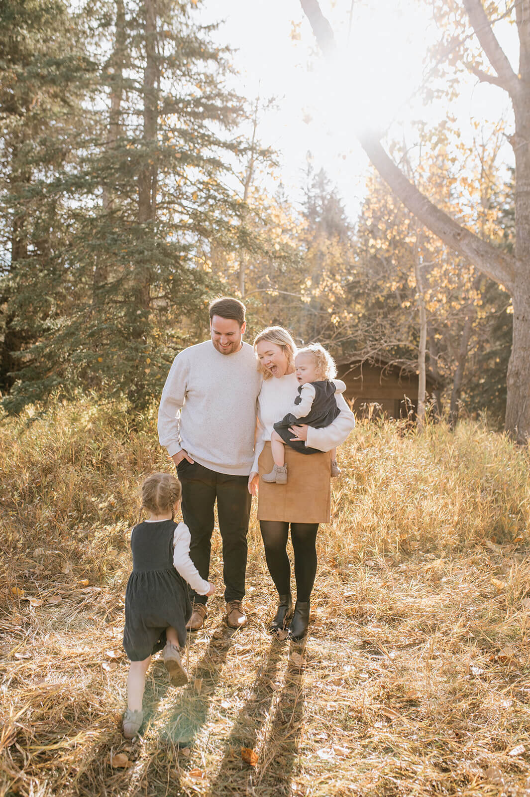 Little-girl-running-towards-family