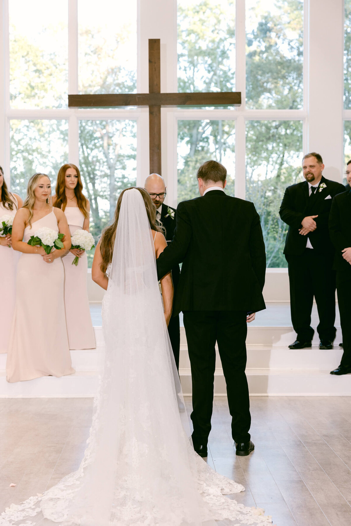 A wedding photo of the bride and groom during the cermeony