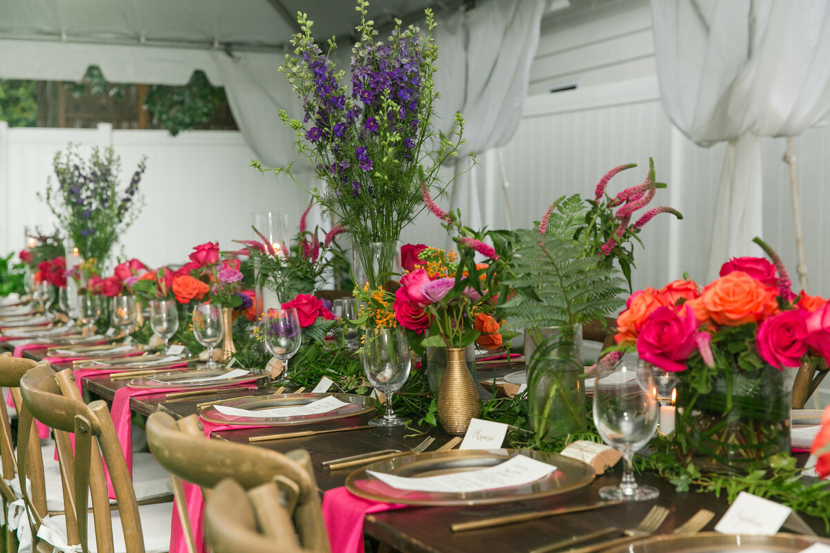 Rustic pink and green florals at wedding reception