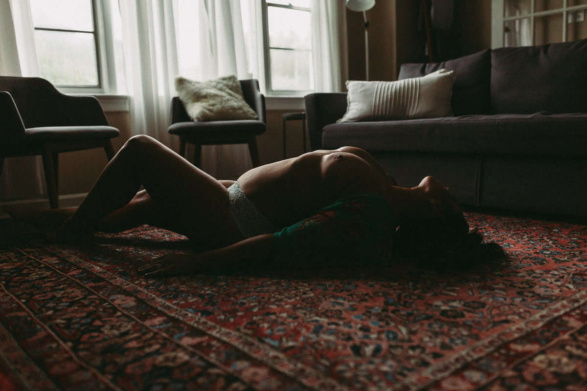 nude woman on floor boudoir imge