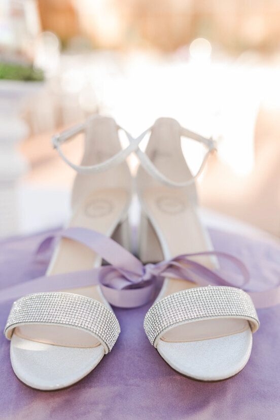 white-shoes-purple-pillow