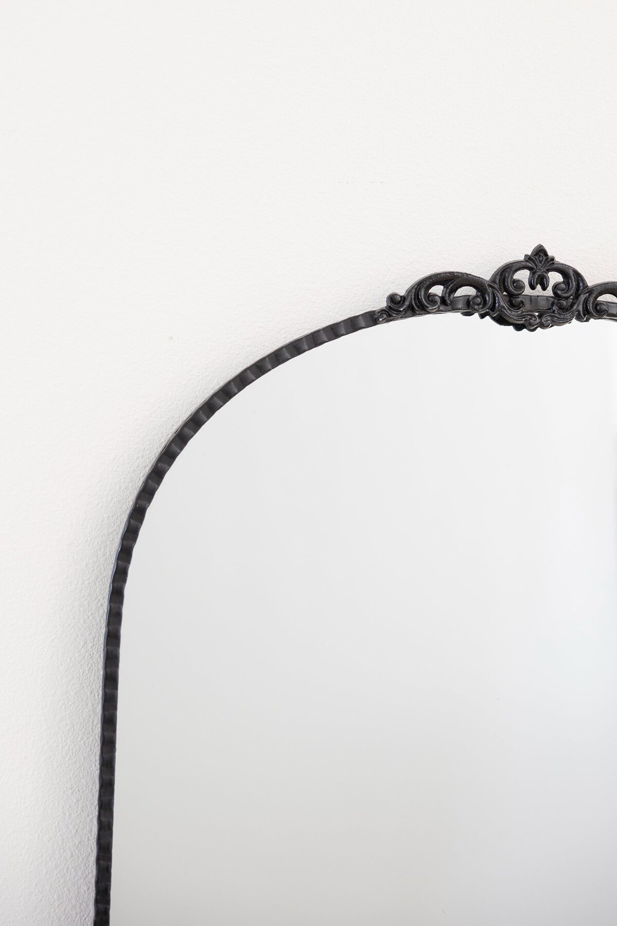 Large black iron mirror 