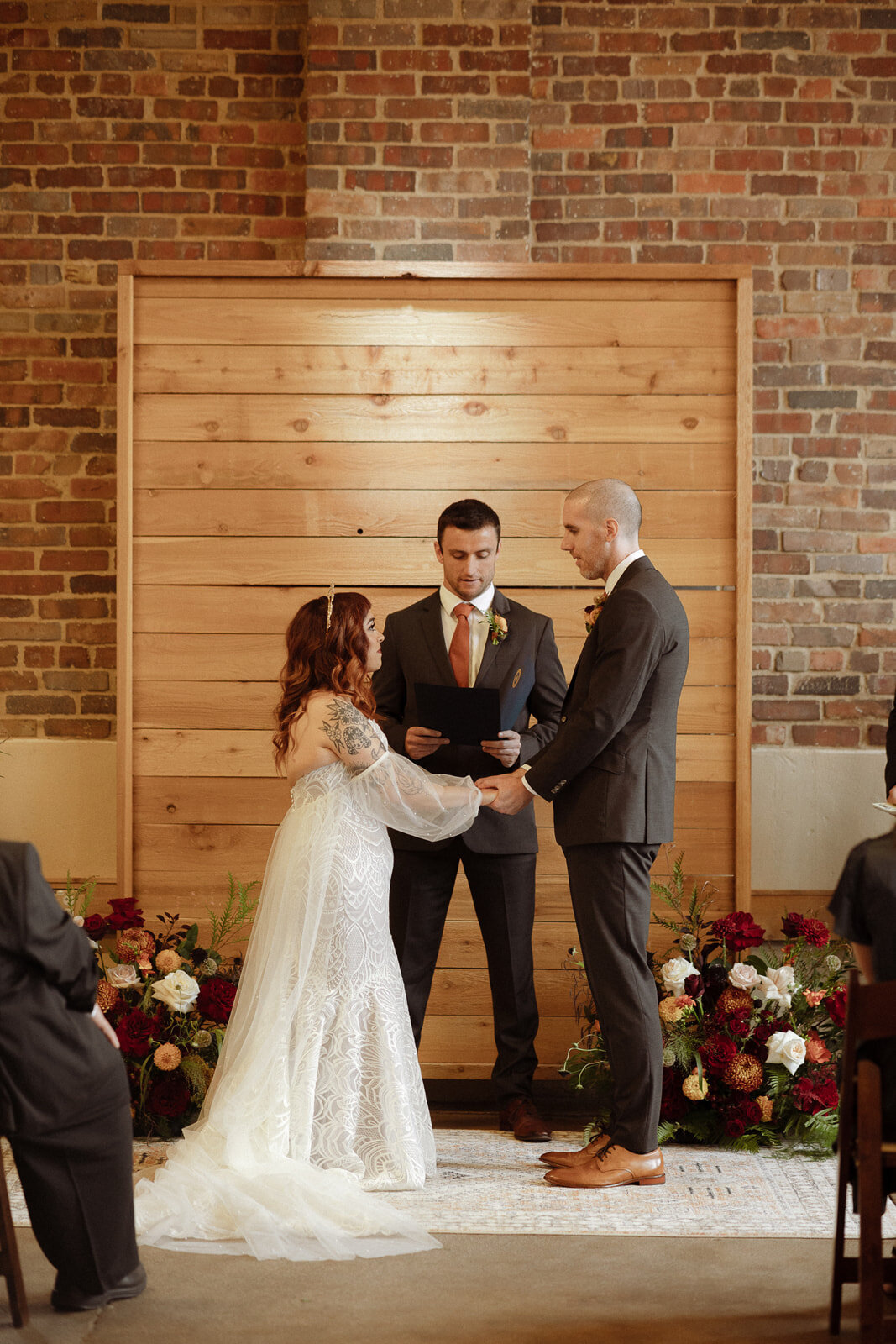 Bride and groom during their wedding ceremony at Upper Larimer.