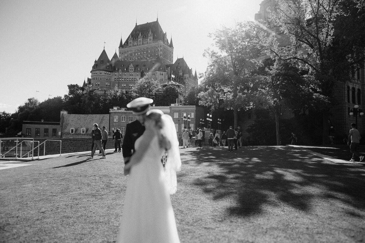 portraits from a navy wedding in old quebec city with the chateau frontenac in the background