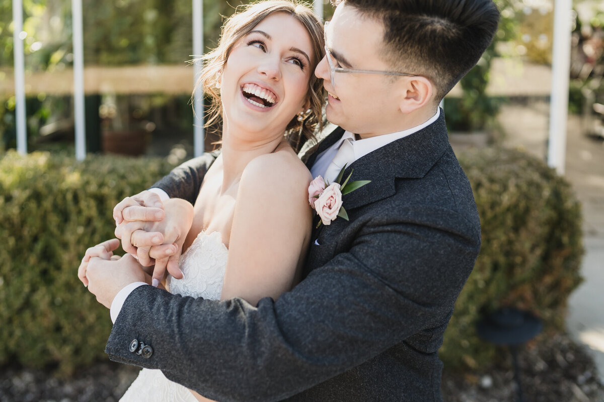 BLUSH AND BLACK SPRING PLANTERRA CONSERVATORY WEDDING IN WEST BLOOMFIELD, MICHIGAN PROVIDED BY KARI DAWSON, TOP-RATED DETROIT WEDING PHOTOGRAPHER, AND HER TEAM84