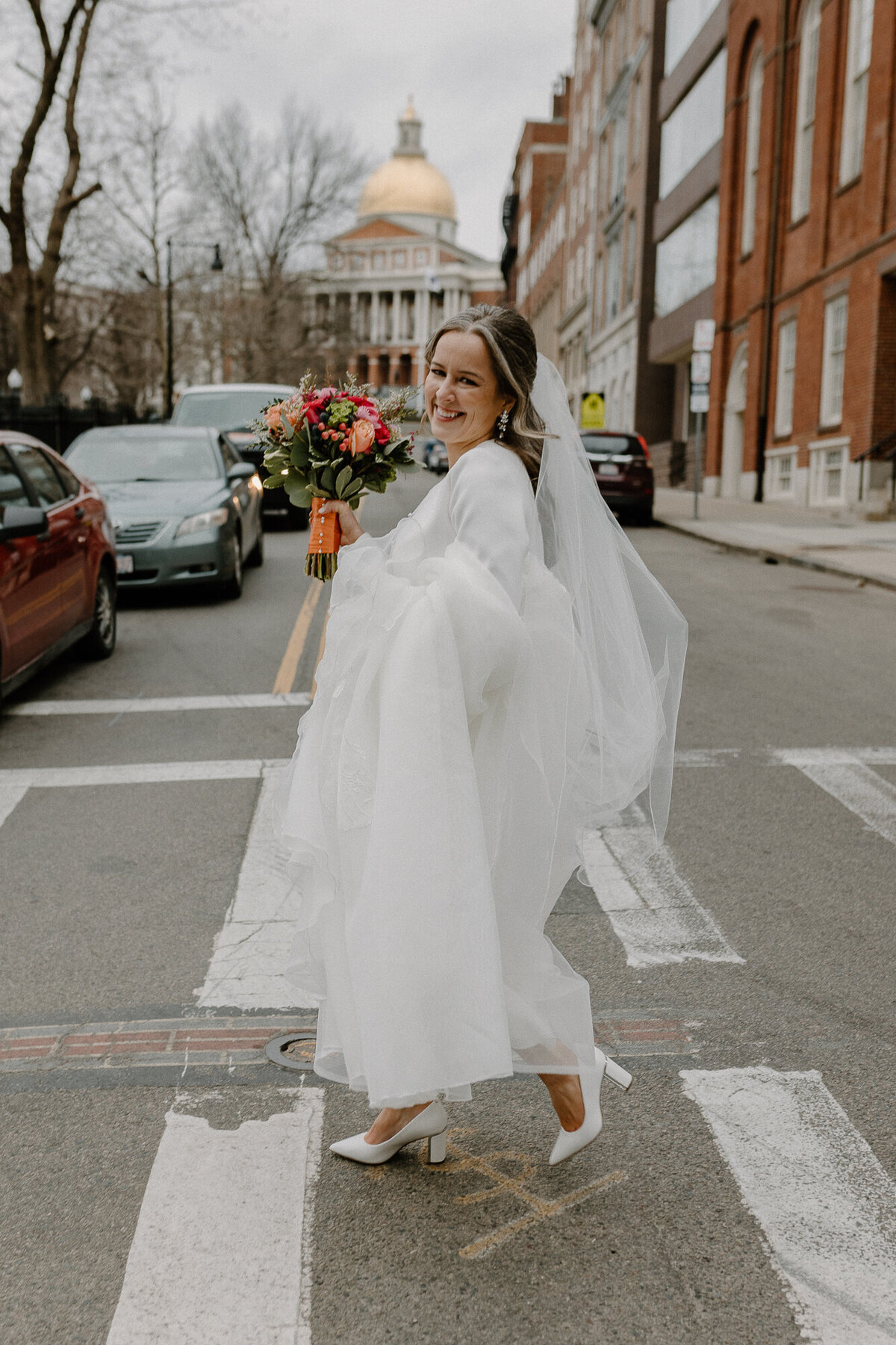 bride walking downtown boston
