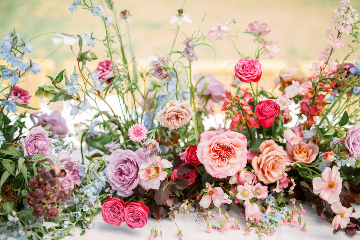 Beautiful pink and coral wedding flower centerpiece