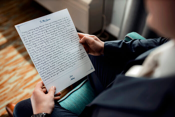 groom-reads-letter-from-bride