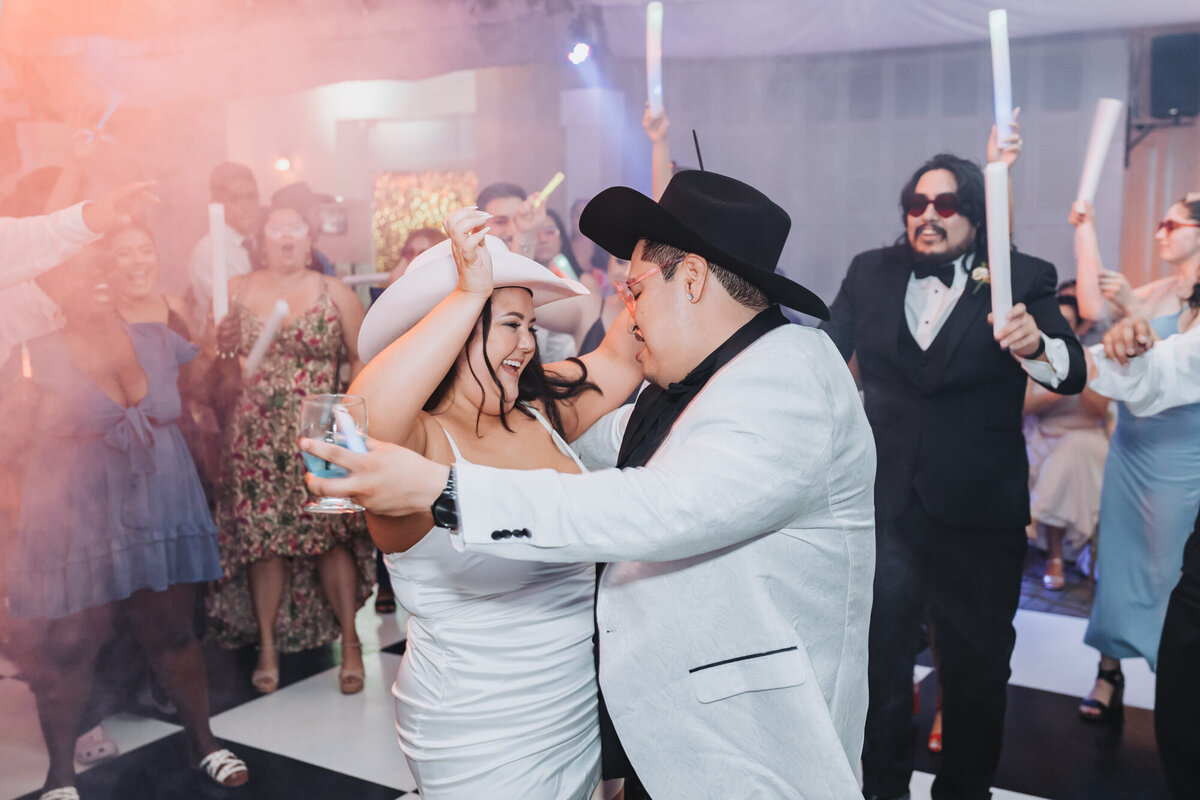 Bride and groom dance during reception