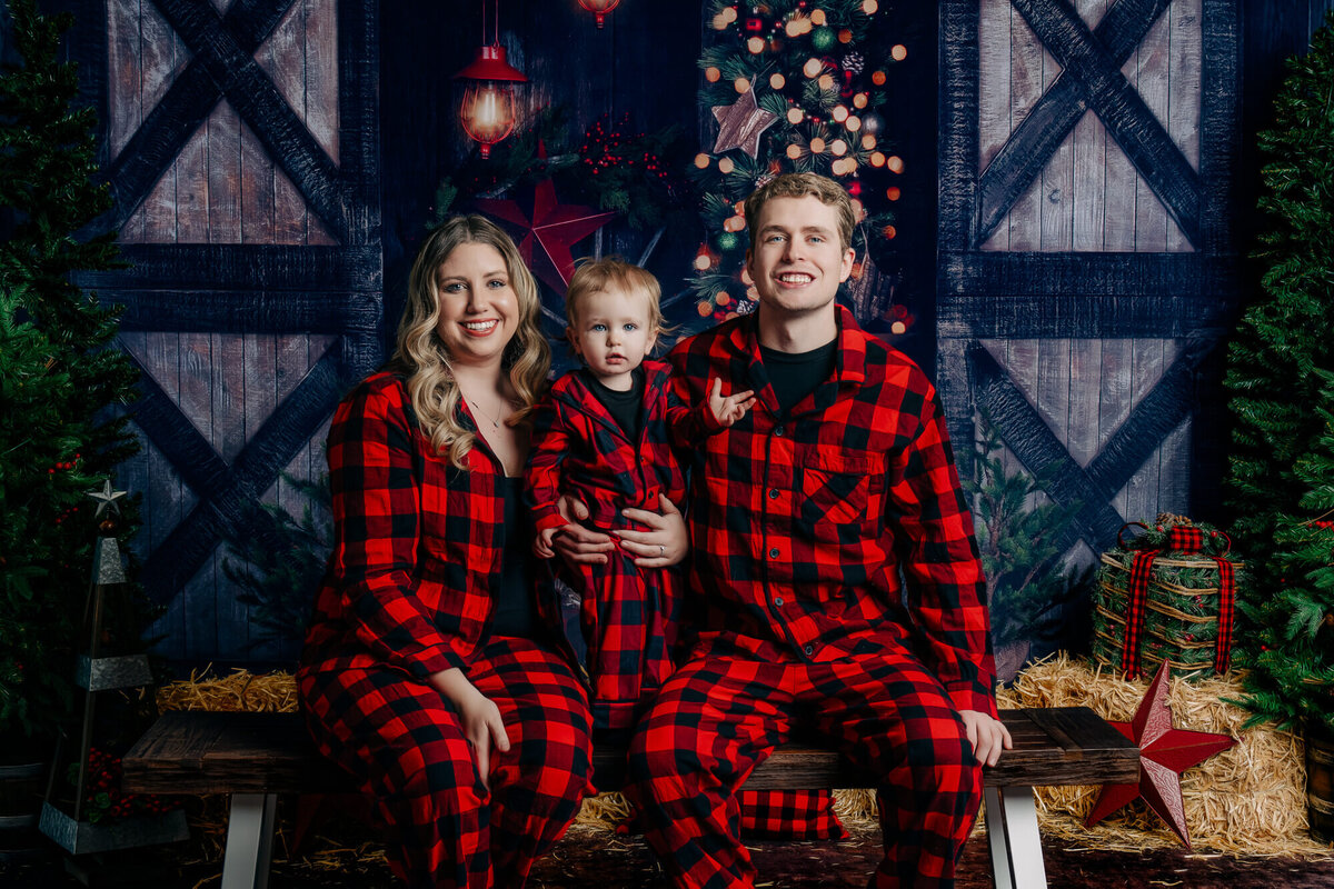 Parents pose with son in holiday Prescott family photos