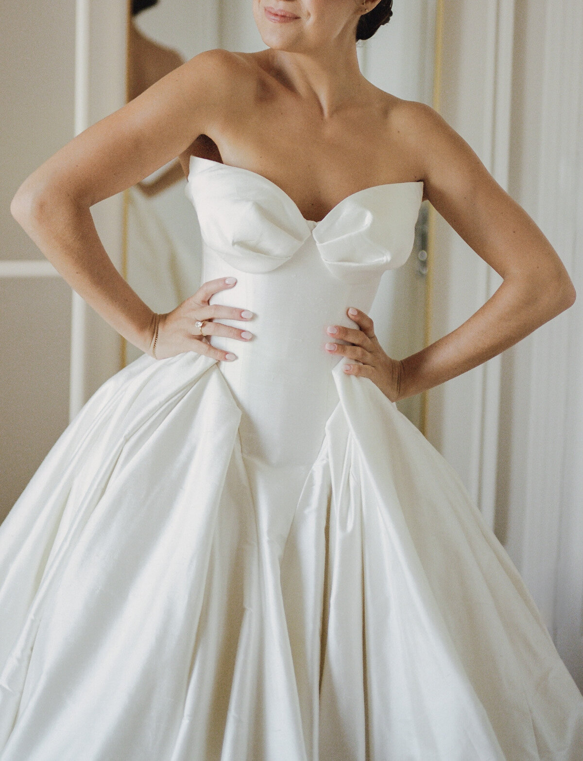 Stunning bodice detail of a Leah Dagloria wedding dress, captured by film photographer Christina Harrison