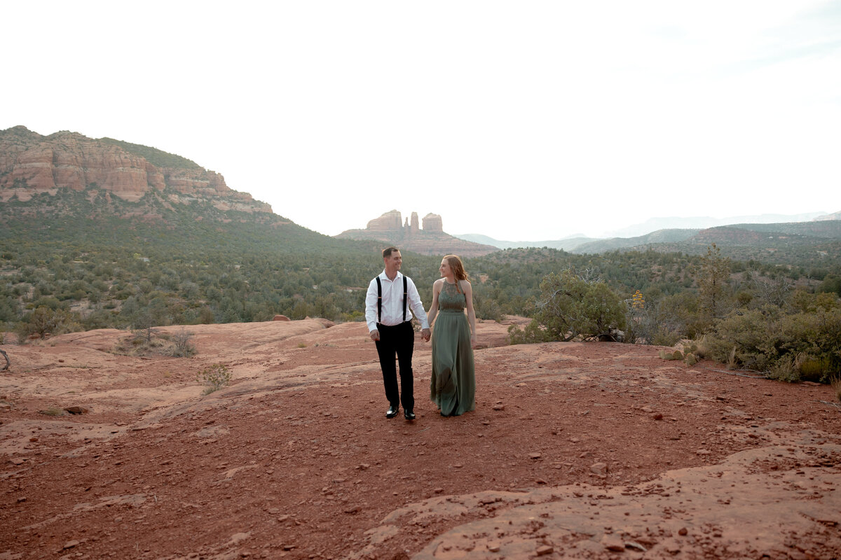 Sunset engagement photo in Sedona with golden Arizona light