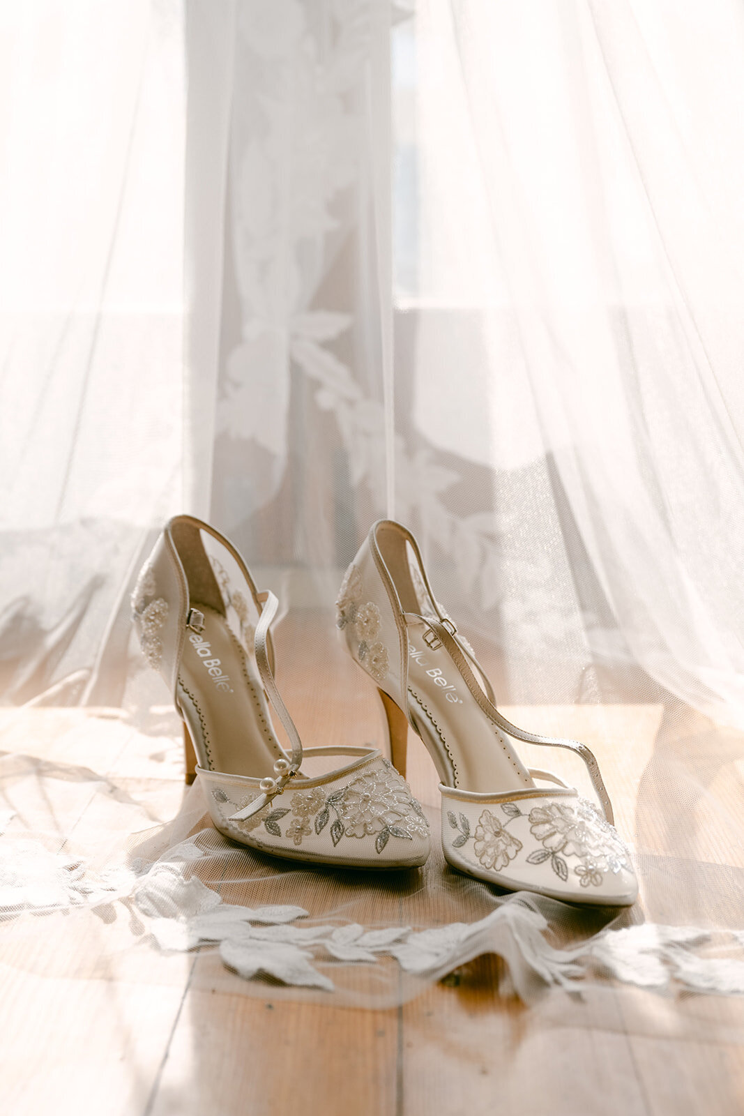 Editorial bridal details featuring gold heels and fine art veil styling photographed in San Antonio