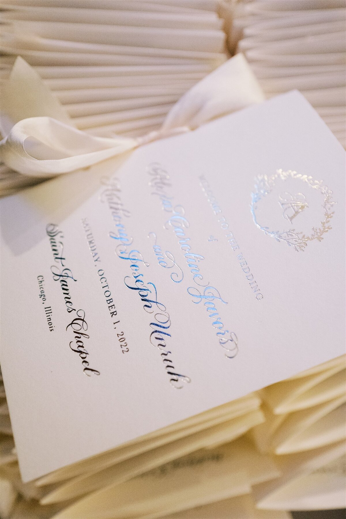 Upclose picture of the wedding invitation. 