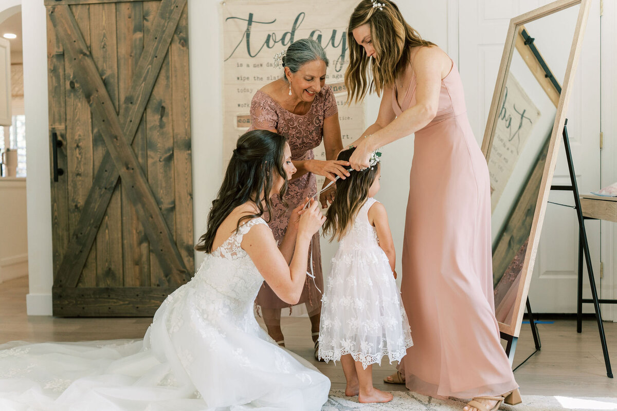 bridesmaids fix flower girl hair