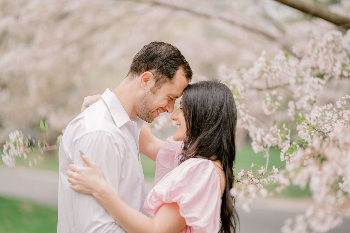 Couple posed forehead to forehead by Virginia Wedding Photographer, Rachael Mattio