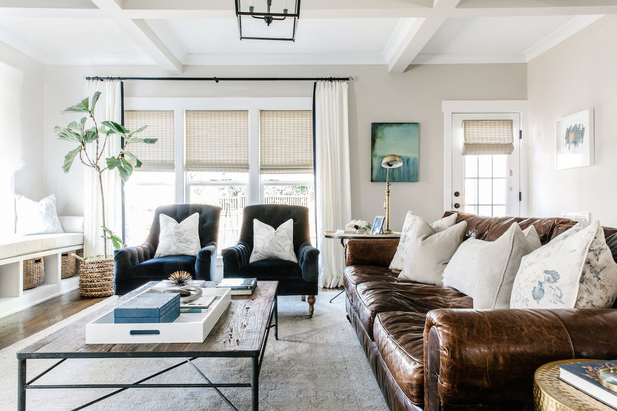 Light-and-bright-living-room-painted-stone-fireplace-with-window-seat-06