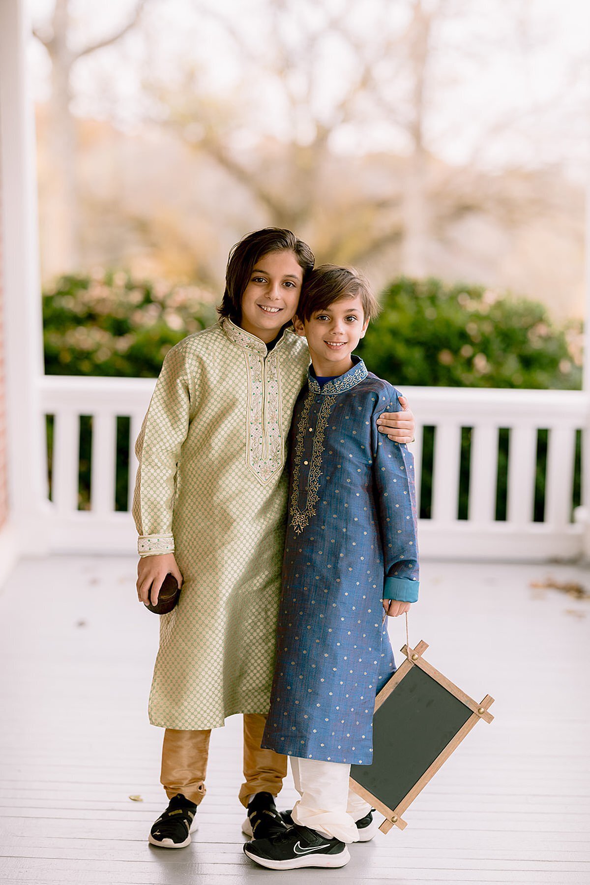 Ring bearers wearing Ivory and blue sherwani at a Nashville Hindu wedding Ravenswood Mansion