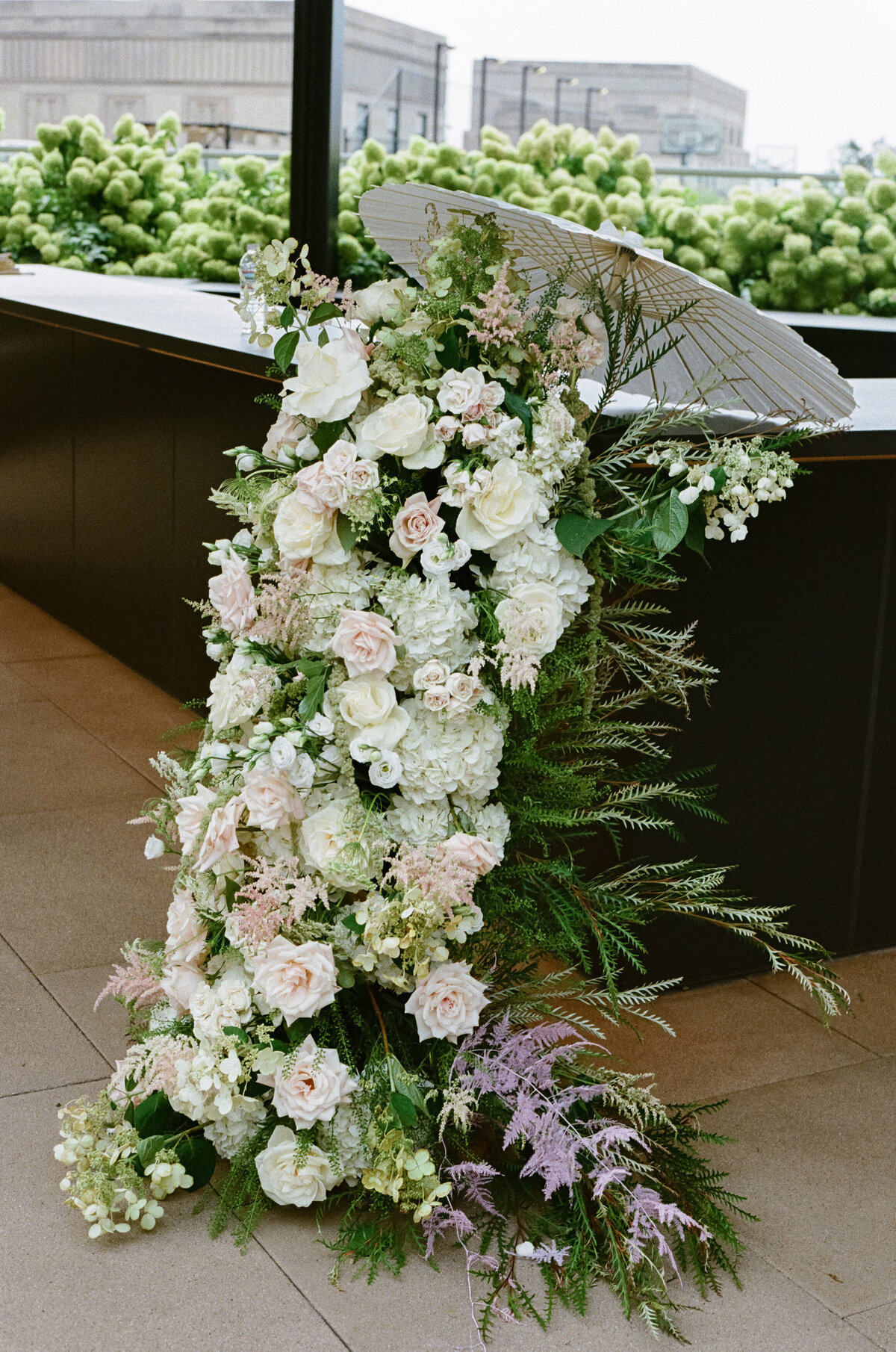 Film photography captures editorial ceremony elegance at Old Post Office Chicago with Lauren Alatriste's fashion forward approach, showcasing architectural beauty while maintaining sophisticated luxury wedding imagery and authentic emotional storytelling.