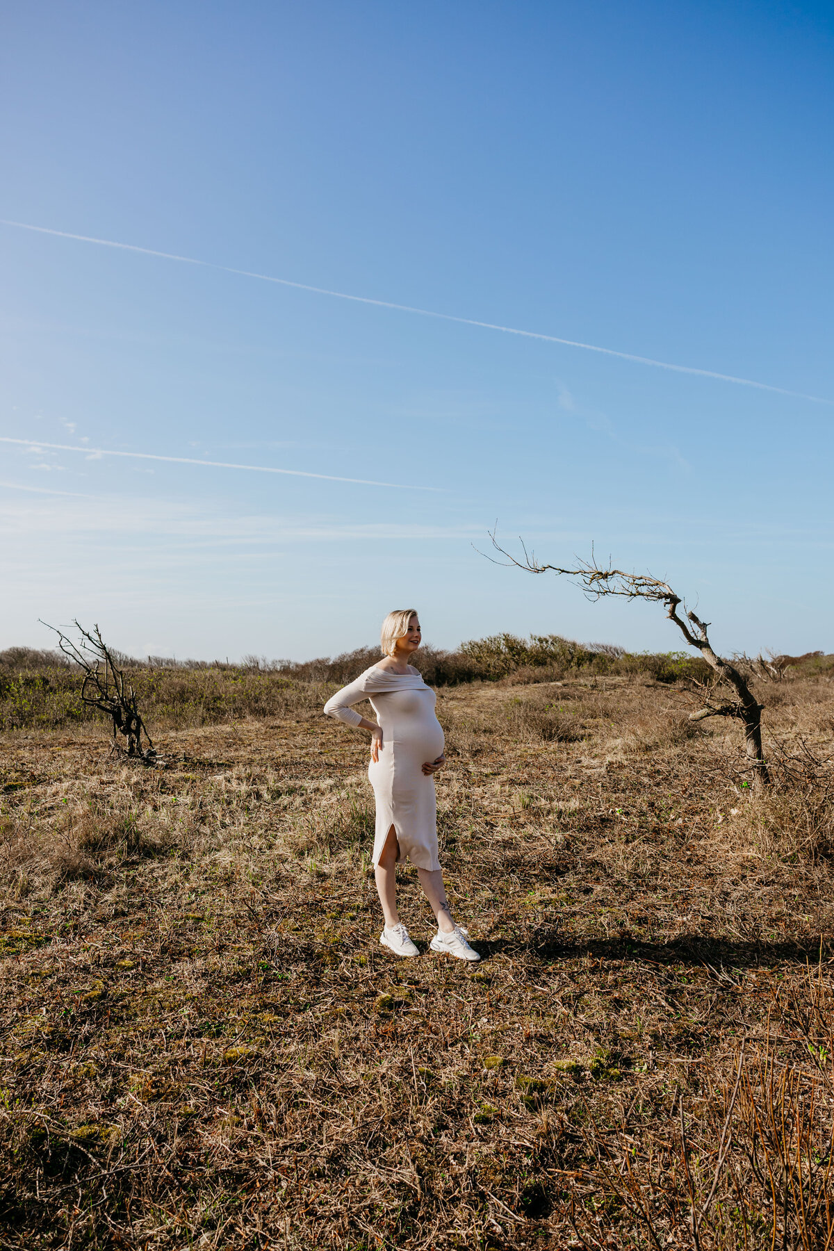 zwangerschapsshoot duinen strand