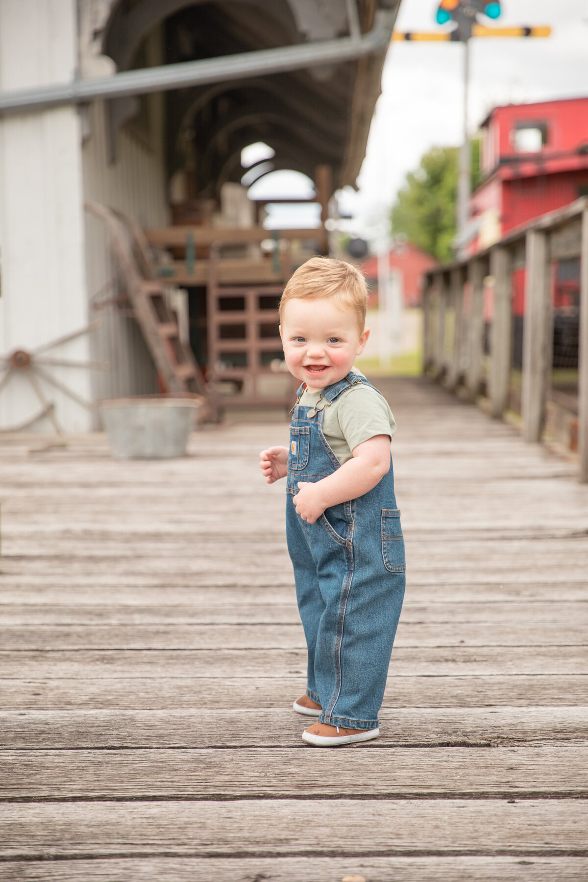 toddler-boy-smiling-train-museum