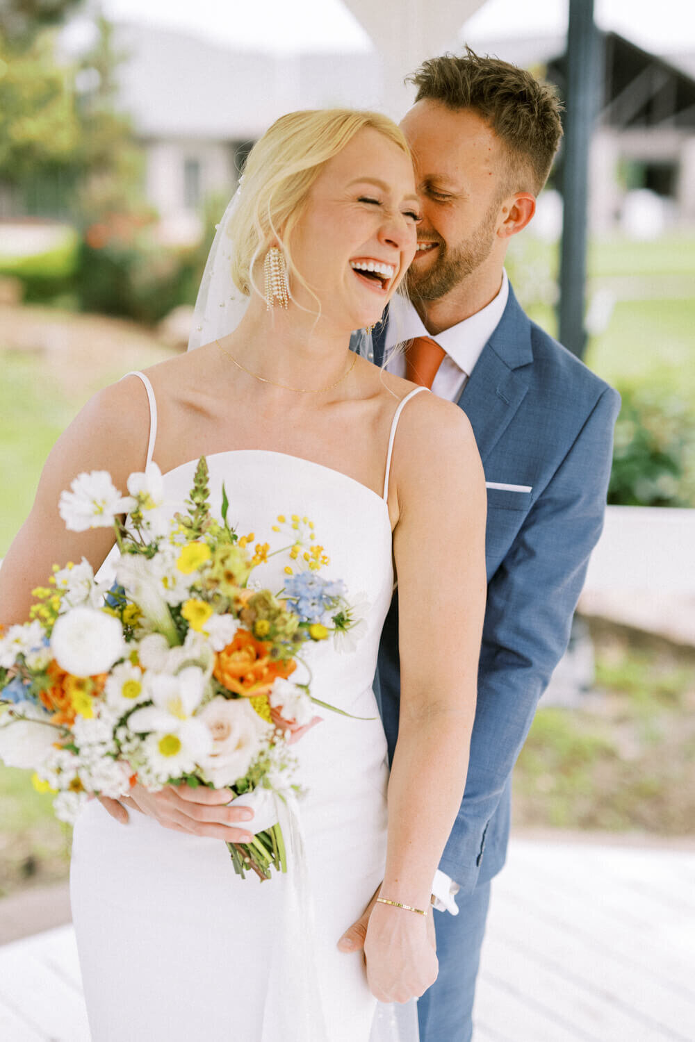 bride-and-groom-laughing-together