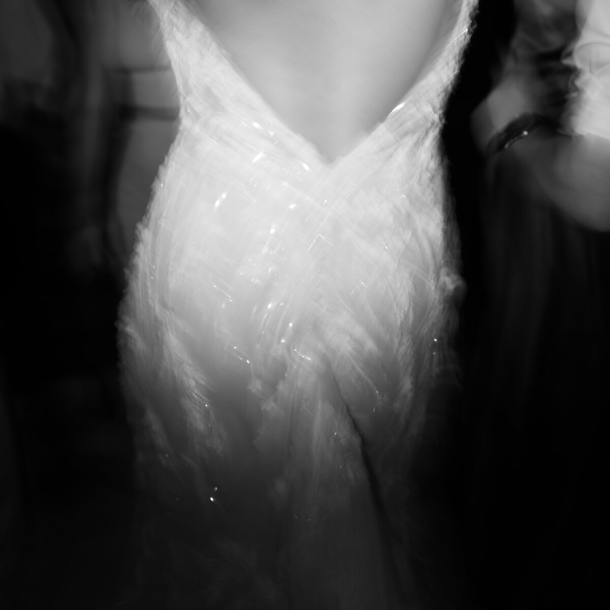 Blurry moment of the bride’s dress while dancing, captured in a documentary wedding photography style — Carmel wedding photography by Kate Winters Photography.