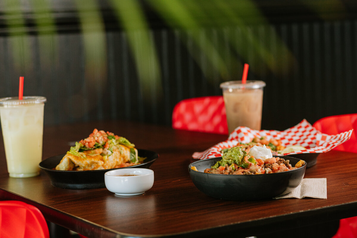 A photo of a quesadilla and California Fries.