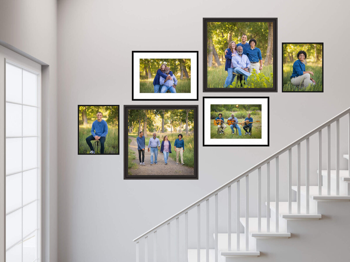 six family portraits hangin on wall by a set of stairs