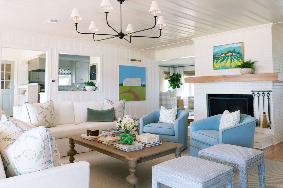 oyster creek happy valley white and blue chairs around wooden coffee table in living room