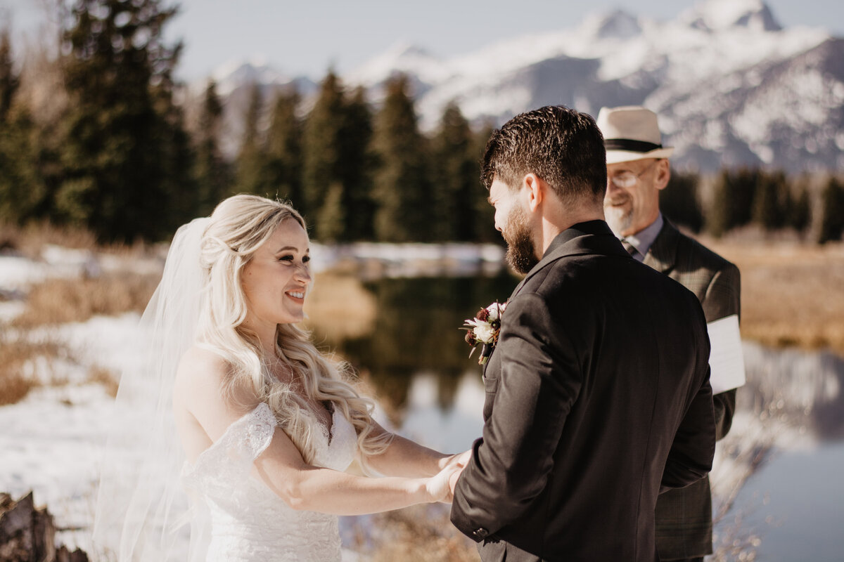 Jackson Hole Photographers capture bride and groom during winter elopement ceremony