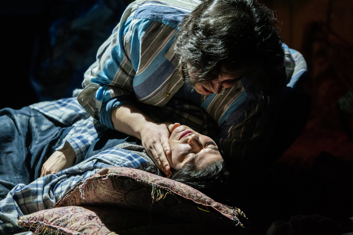 Two people performing during a play