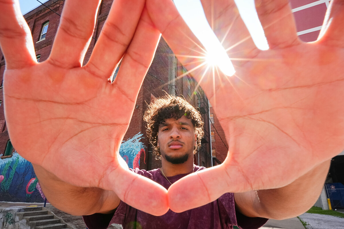 kansas-city-marketing-photography-people-0116-person-with-hands-framing-camera