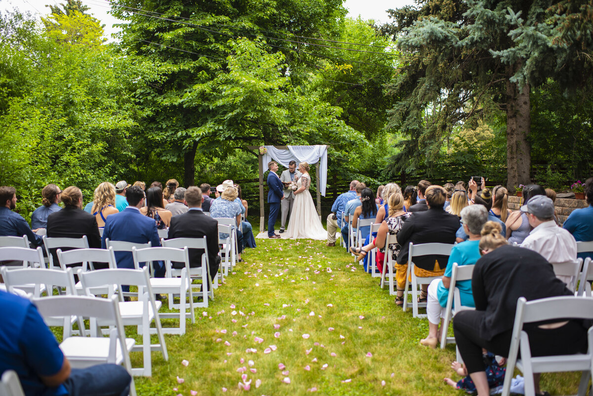 Backyard wedding with class and greenery