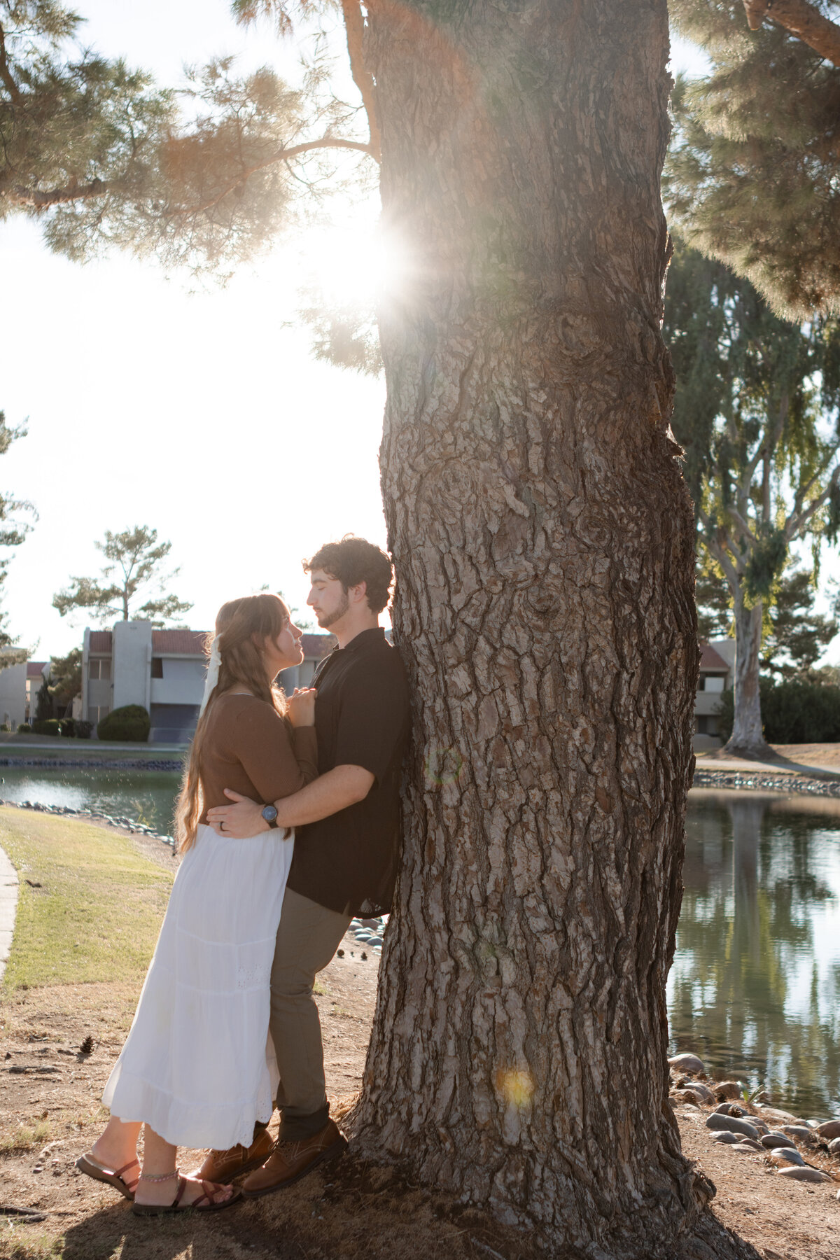 Jovanna G Photography. Classic, sophisticated Wedding Photos. Soft romantic engagement photos. Soft romantic WeddingPhotos. Sophisticated Wedding Photographer. Professional Wedding Photographer. Destination Wedding Photographer. Luxury Wedding photographer. Traveling Wedding Photographer. AZ Wedding Photographer. Gilbert AZ Wedding Photographer. Queen Creek Wedding Photographer. Phoenix Wedding Photographer. Scottsdale Wedding Photographer. Flagstaff Wedding Photographer. SoCal Wedding Photographer. California Wedding Photographer. Northern California Wedding Photographer. Southern California Wedding Photographer. San Francisco Wedding Photographer. Bay Area Wedding Photographer. San Jose Wedding Photographer. Golden Gate Bridge Wedding Photographer. Beach Lover Wedding Photographer. Palace of the Fine Arts Wedding Photographer. Ocean Lover. I love California. Orange County Wedding Photographer. Newport Beach Couples Photographer. Newport Beach Wedding Photographer. Laguna Beach Couples Beach Engagement Photographer. Laguna Beach wedding beach photographer. Los Angeles Wedding Photographer. Young and in love engaged couples who live in southern California. Christian Young Couple. Young Engaged Couple. Engaged High School Christian Couple. Christian Values. Young conservative Christian women. Young Conservative Christian men. Young Conservative Christian Couple. Young Christian Couple Engaged in High School. Young Christian College Couple. Lakeside Lovers in the Autumn Sun. David & Grace - engagement photos. Jovanna G Photographer Engagement Photos. Arizona sun shining through autumn trees- engagement. Chandler, AZ Engagement Photos. Chandler, AZ 2026 bride. Chandler, AZ Wedding Photographer. Chandler, AZ Young Engaged Couple. Girl in her 20s. Engaged Arizona Girl in her 20s. Lakeside Engagement photos. AZ Lakeside Engagement Photos. AZ Weeping Willow Lakeside Proposal. Arizona Lakeside Proposal with weeping willow tree. Detail shot of engagement ring on Arizona Lakeside estate. Chandler, AZ Lakeside Estate Proposal Outfit Inspiration.
