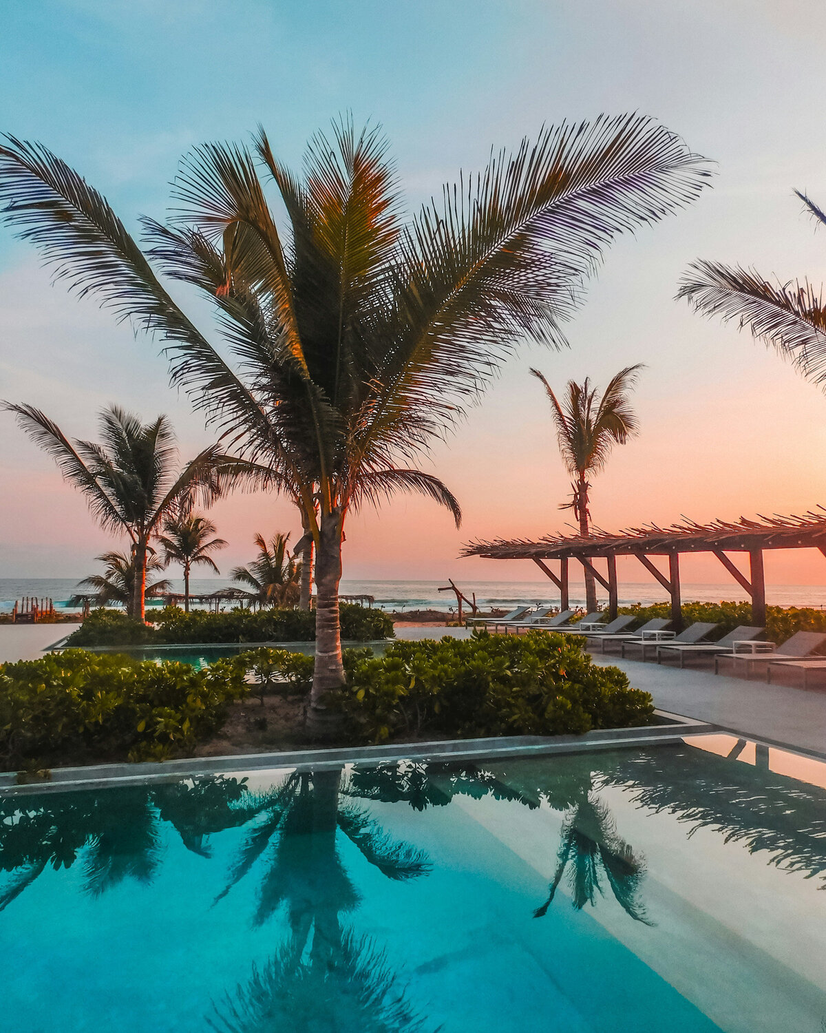 Luxurious resort with swimming pool and trees