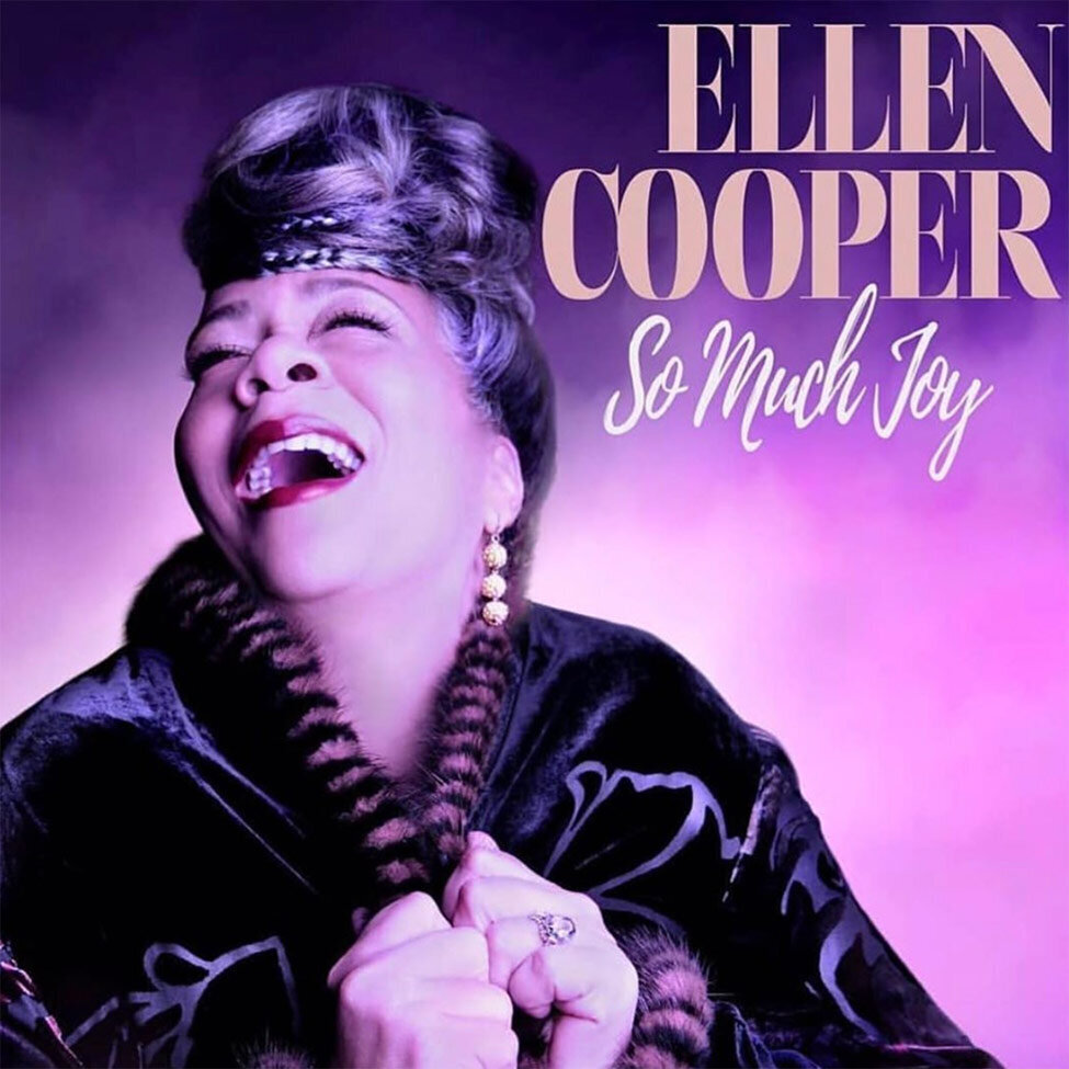 Single Cover Ellen Cooper So Much Joy singer clasping lapels of coat looking up smiling toned purple