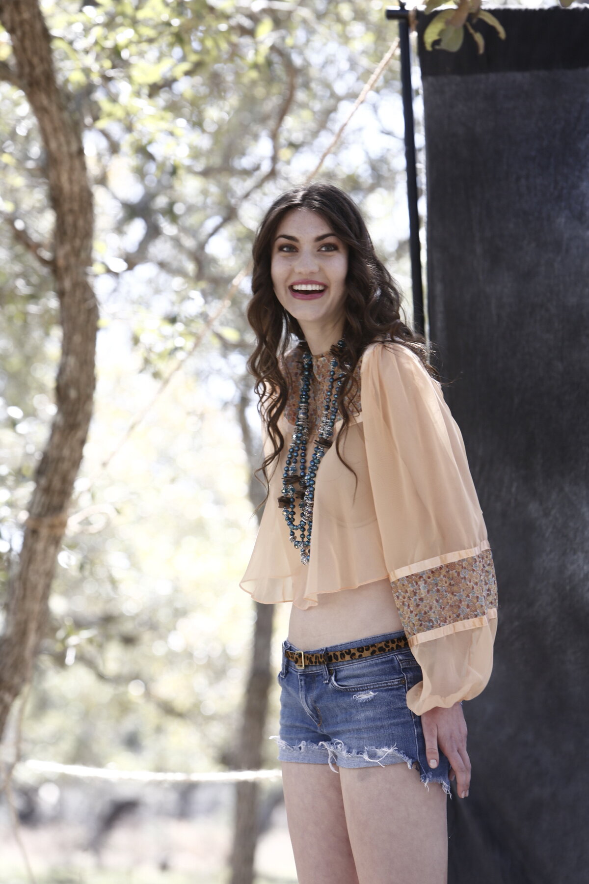 Model-portfolio-styling-shorts-smiling