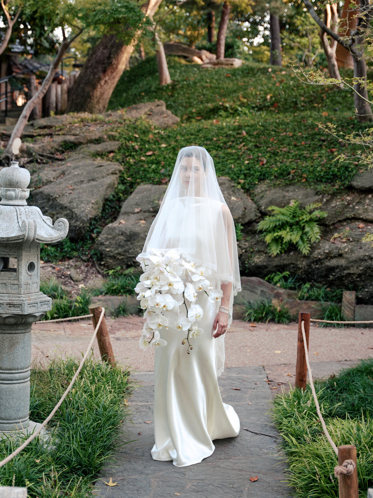 Bride standing in the Fort Worth Japanese Gardens