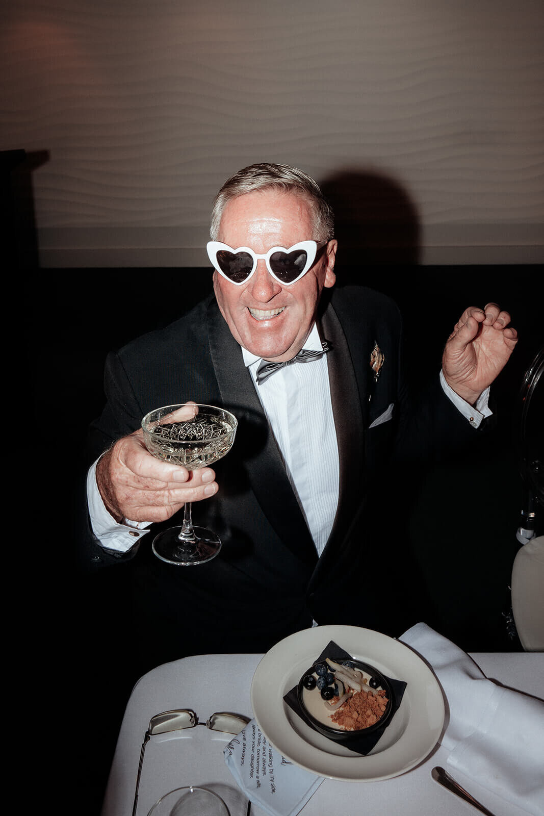 Father of the bride drinking a cocktail